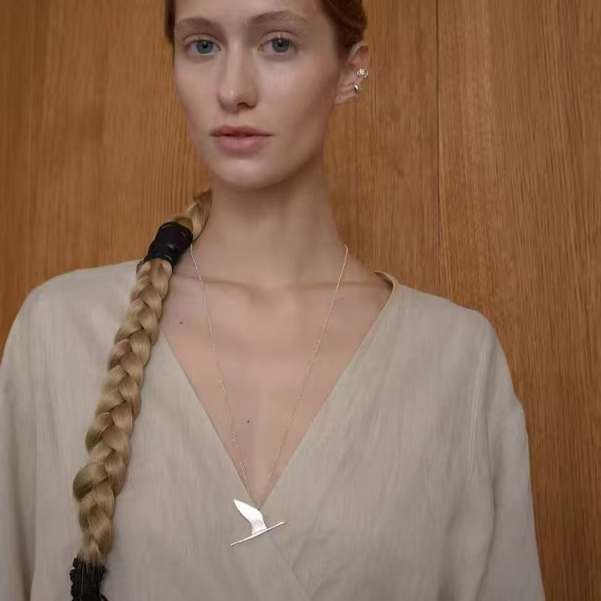 crane pendant sweater necklace